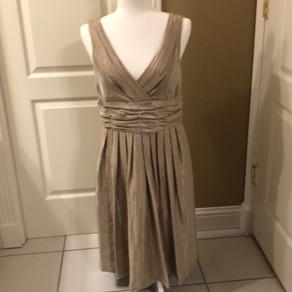London Times gold sparkle dress with pockets.